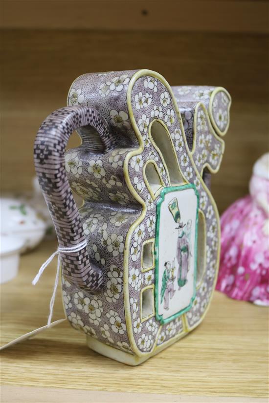 A 19th century Chinese enamelled biscuit Fu wine pot and cover, repaired